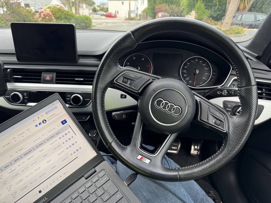 Audi A4 Avant dashboard showing AdBlue warning before Kernowsport fix