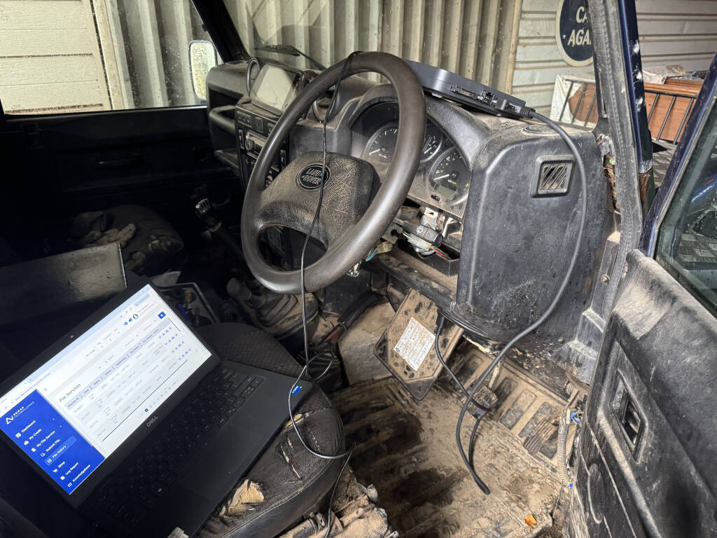 Kernowsport technician tuning Land Rover Defender for improved performance in Bodmin, Cornwall.