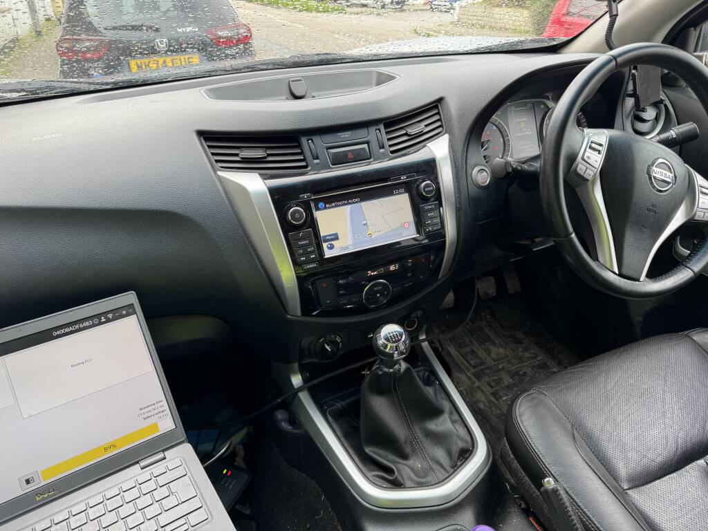 KernowSport technician working on a Nissan Navara with an AdBlue warning in Longrock.