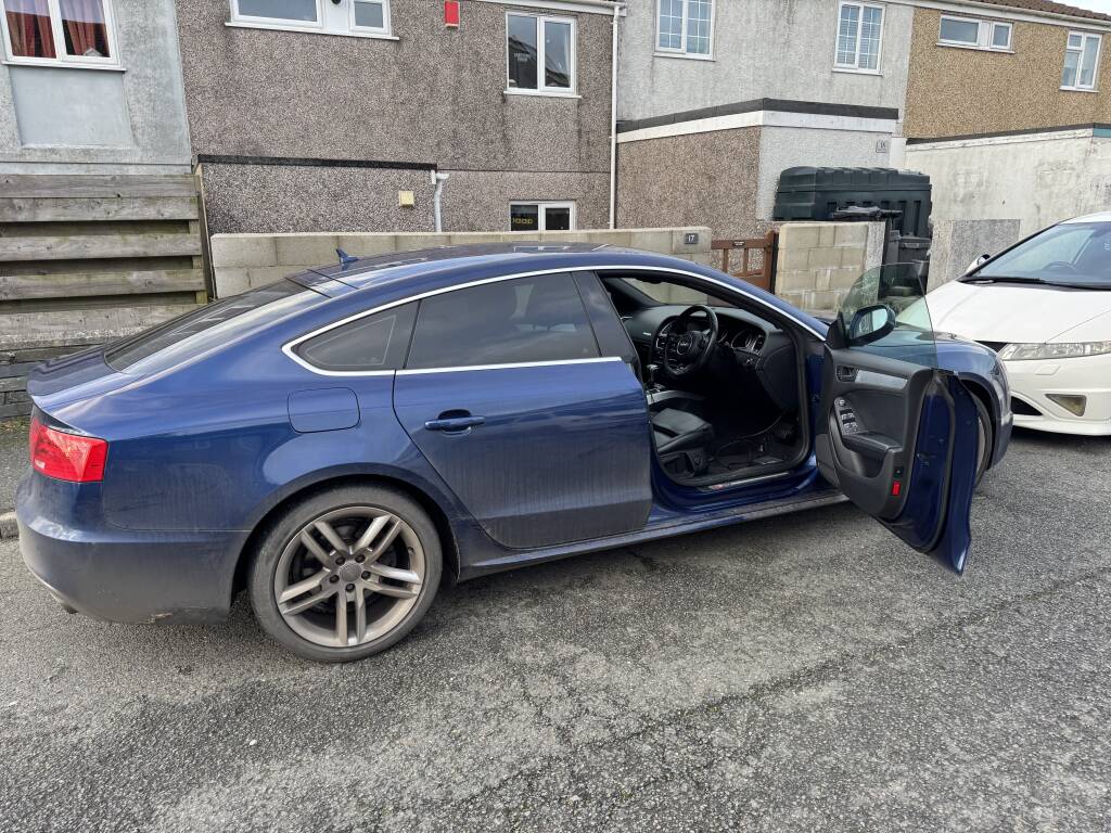 Audi A5 V6 undergoing EGR delete with professional ECU tuning equipment.
