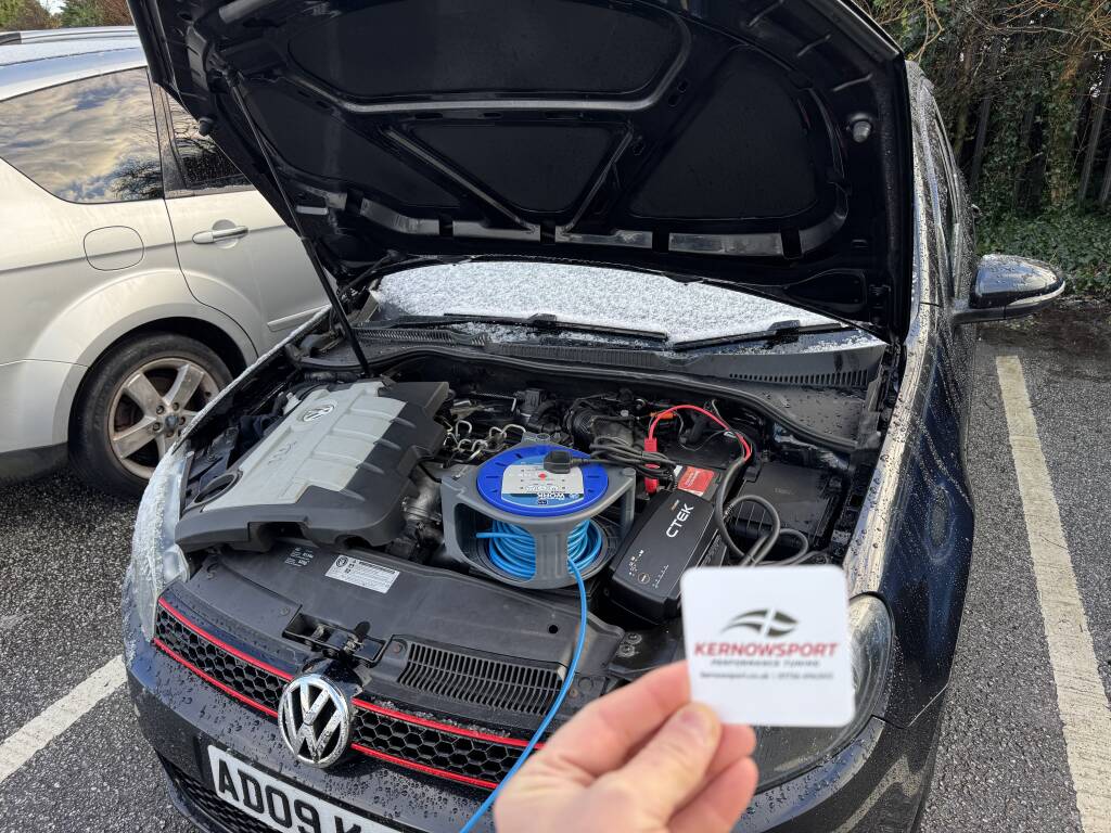 Ctek Battery Conditioner Connected to Vw Golf During Ecu Programming. - Kernowsport Performance Tuning CTEK battery conditioner connected to VW Golf during ECU programming.